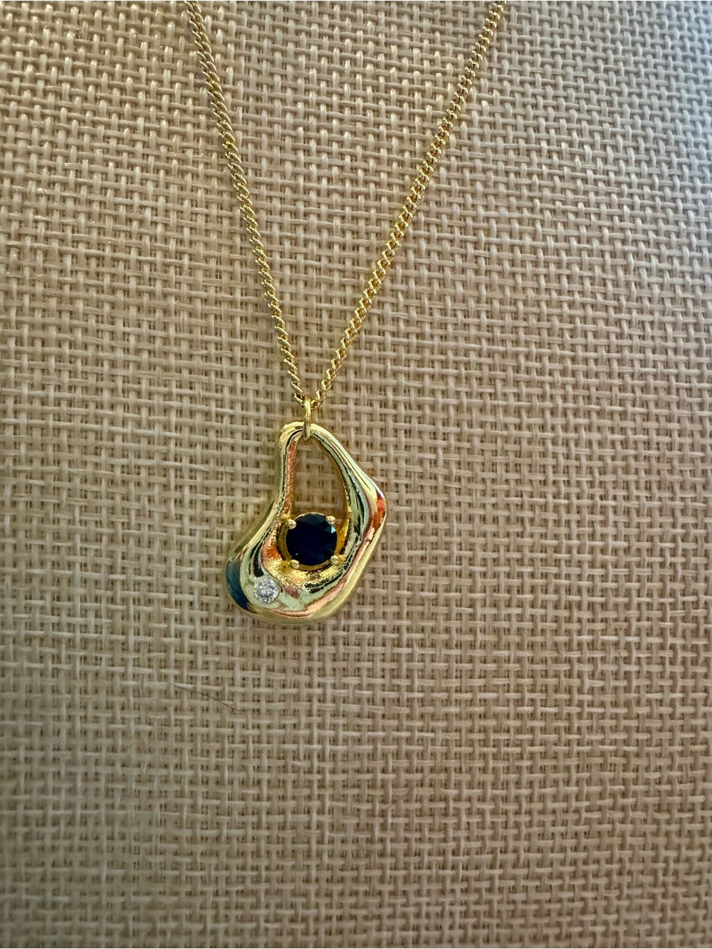 Gold Teardrop Pendant Necklace with Black and Clear Stones